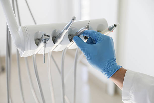 Professional Dental Implants technician working in Sherrill, NY